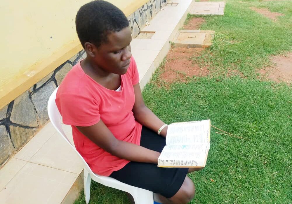 Ugandan Woman Reading Bible